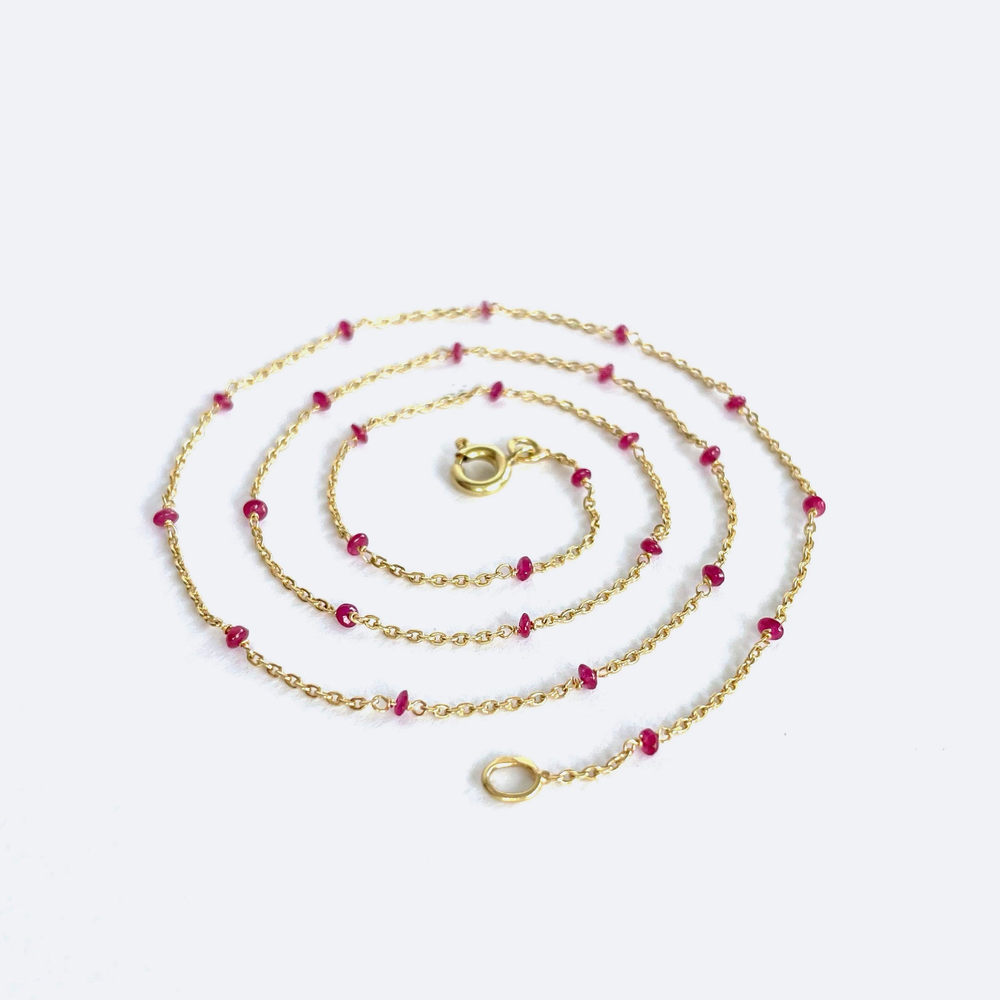 Gold necklace with rubies