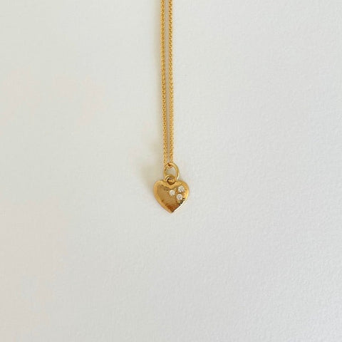 Gold necklace with heart and diamonds
