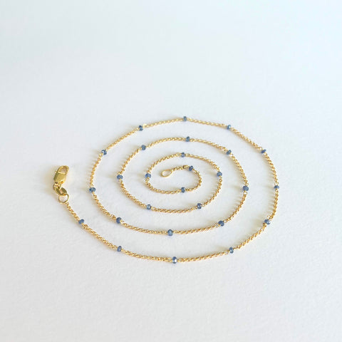 `Gold necklace with sapphires