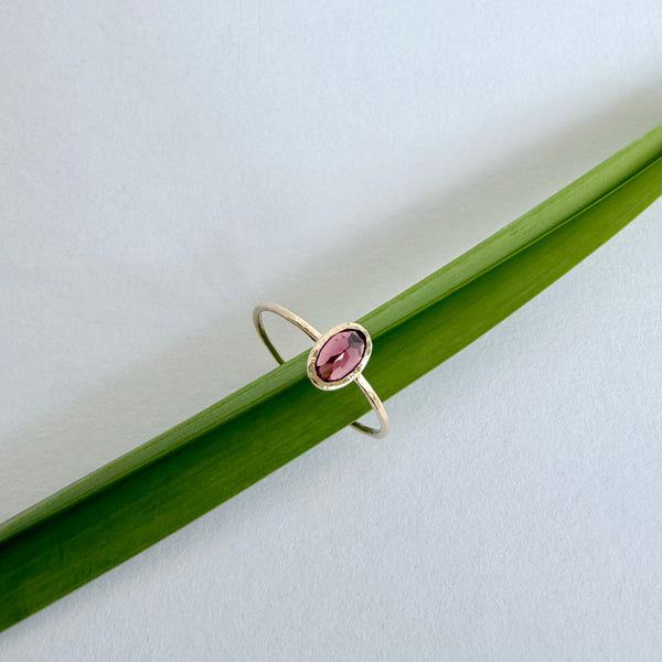 Gold ring with garnet