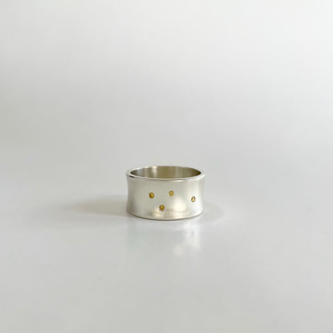 Silver ring with yellow diamonds