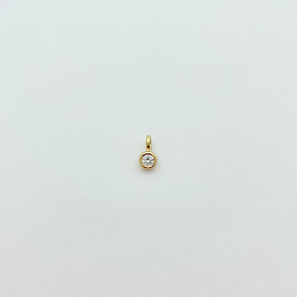 Gold necklace with diamond charm