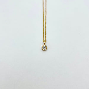 Gold necklace with diamond charm