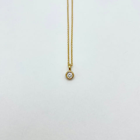 Gold necklace with diamond charm