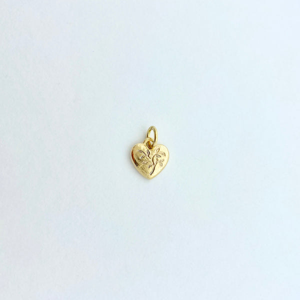 Gold heart charm with engraving