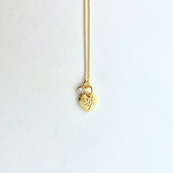 Gold heart charm with engraving