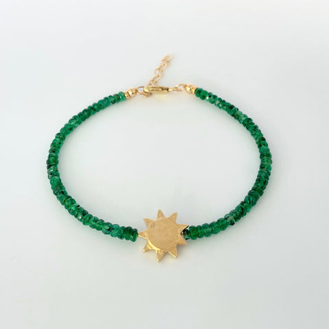 Emerald bracelet with gold sun