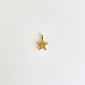 Gold star charm