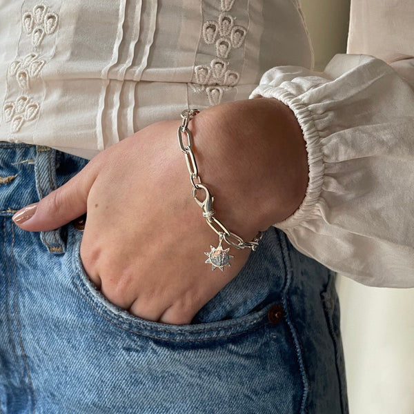 Silver bracelet with silver sun