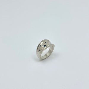 Silver ring with teal blue diamonds