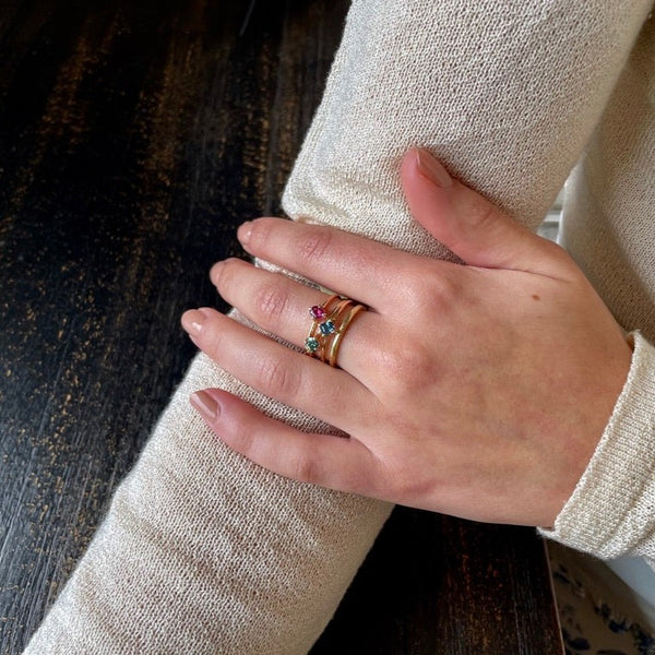Gold ring with oval ruby 4 prong