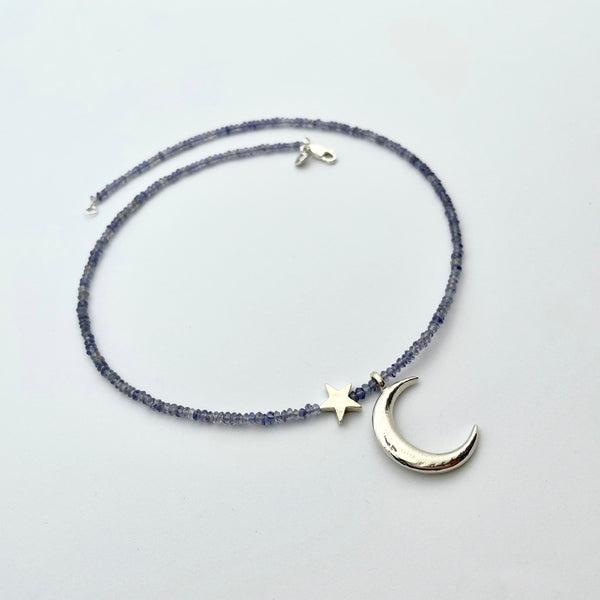 Necklace with iolite, silver moon and star