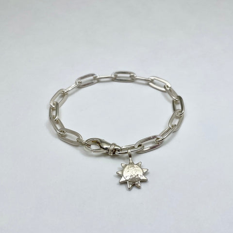 Silver bracelet with silver sun