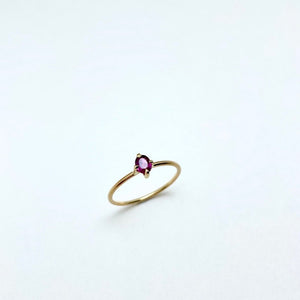 Gold ring with oval ruby 4 prong