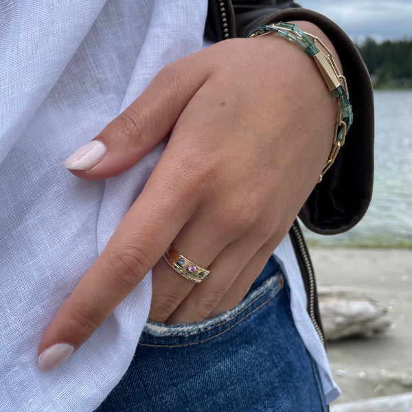 Gold ring with multi colored sapphires