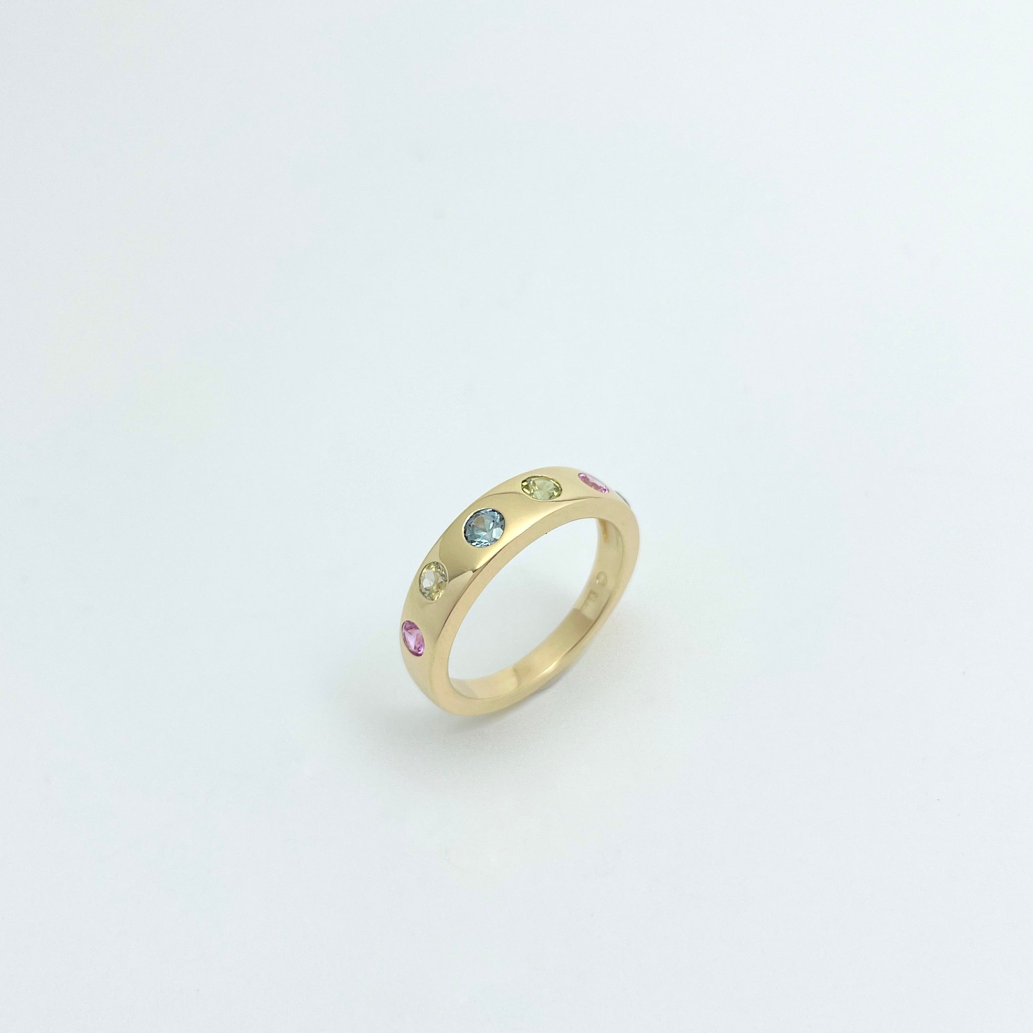 Gold ring with multi colored sapphires