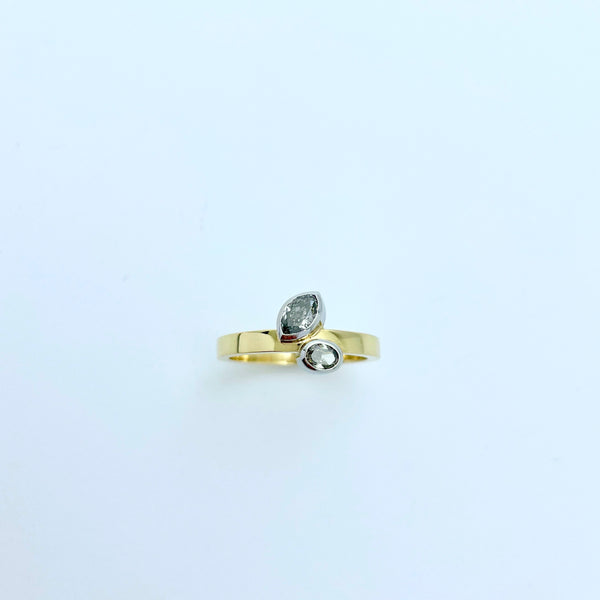 Gold ring with 2 grey diamonds set in platinum