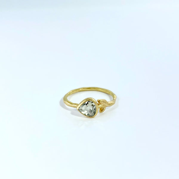 Gold ring with heart shaped diamond