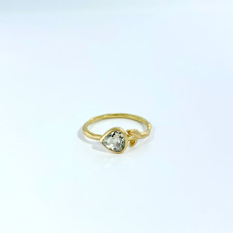 Gold ring with heart shaped diamond