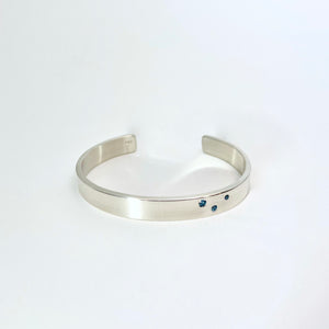 Silver cuff with blue diamonds