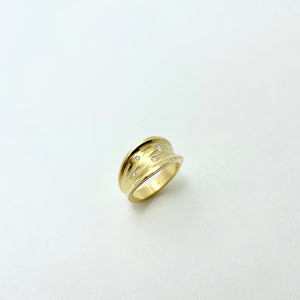 Gold ring with white diamonds