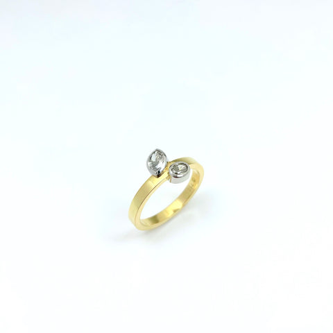Gold ring with 2 grey diamonds set in platinum