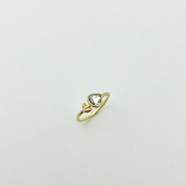 Gold ring with heart shaped diamond