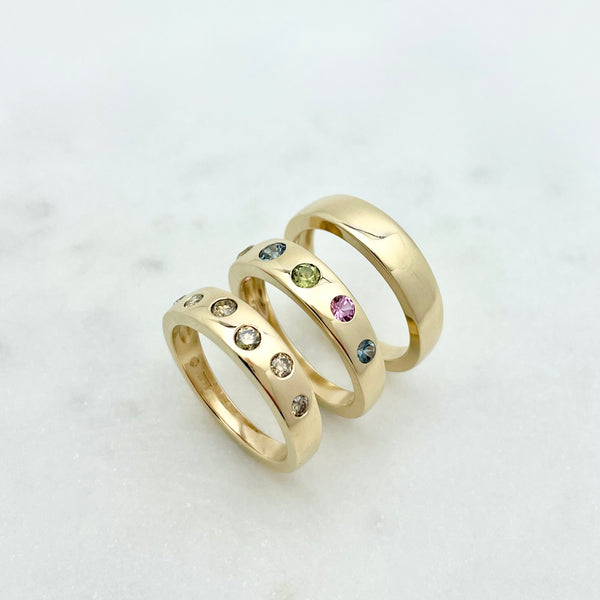 Gold ring with multi colored sapphires