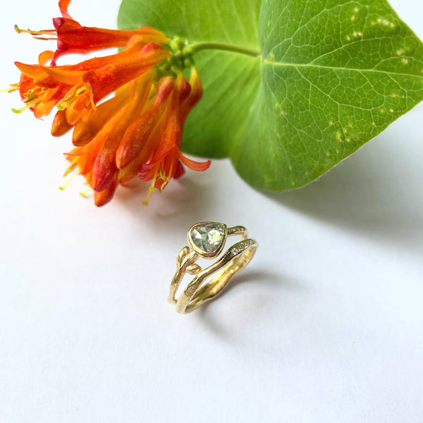 Gold ring with heart shaped diamond